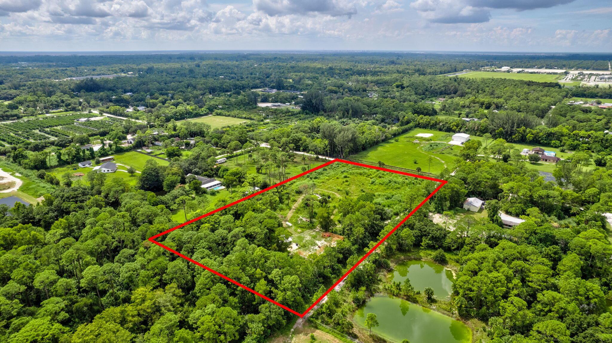 A 5-acre paradise, perfect for your agricultural/residential dreams! A 40x100 Mixed Livestock Barn Structure designed to house goats, chickens & pigs is 75% completed. Building materials to continue the structure are also included. Enjoy 200 AMP electric service (2022) WELL (Aug 2023) with a 30-gallon pressure tank &1000 gallon Septic system (June 2025). The entire property is fenced with chain link, ensuring security for your animals. Most of the land is cleared, adorned with native trees and plants, and includes two 12-foot gates for easy access. A 25x50 cement slab remains from a demolished house, suitable for a motorhome with electric hookup, offering versatility. Zoned for agricultural residential use, don't miss this unique opportunity to create your dream homestead!