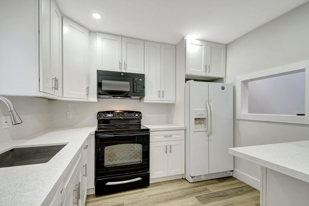 Photo of 2671 Boundbrook Boulevard #102, Palm Springs, FL 33406 (MLS # R10959452)