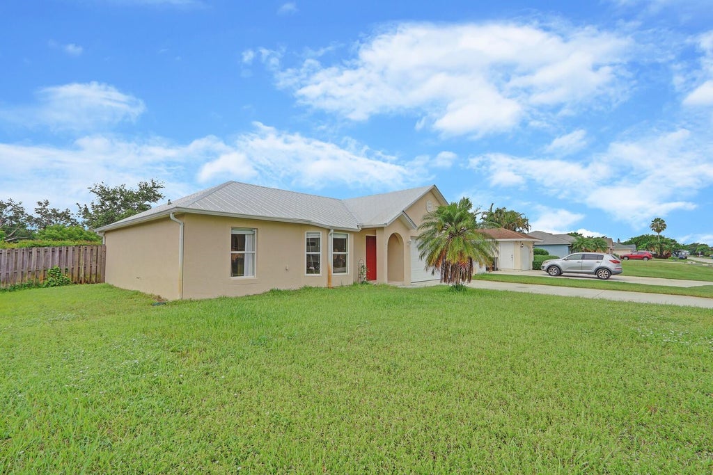 Photo of 882 SW Butterfly Terrace, Port Saint Lucie, FL 34953 (MLS # F10456747)