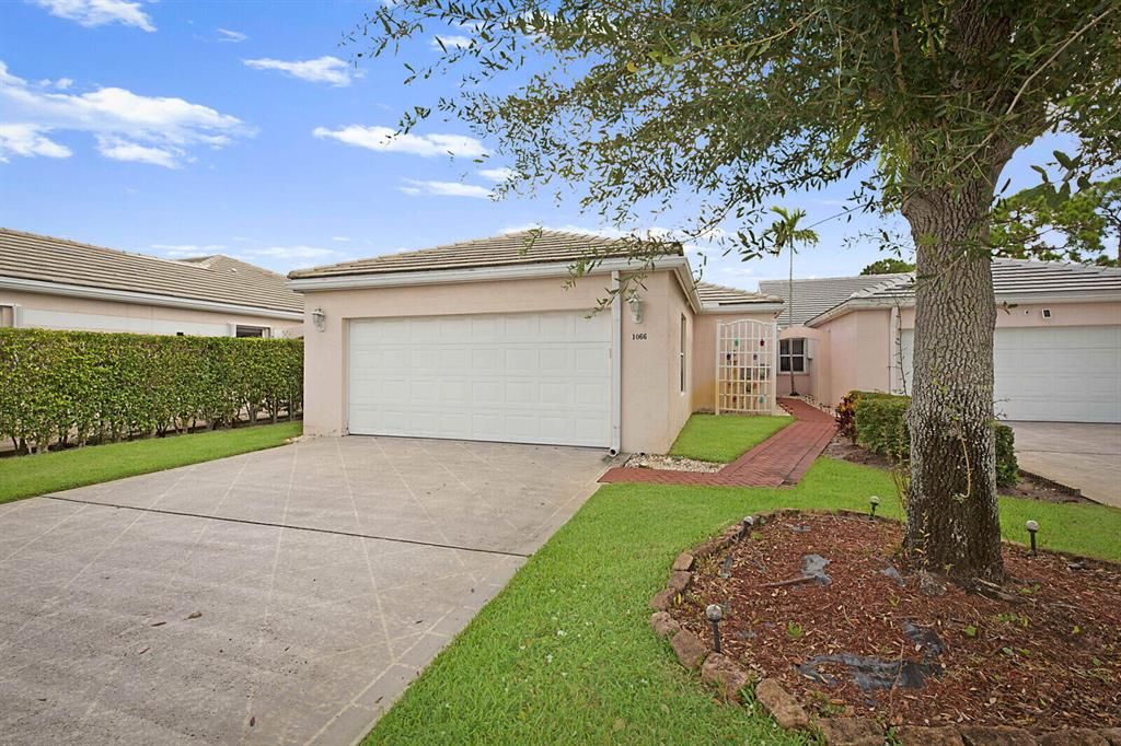 Photo of 1066 Island Manor Drive Dr, Green Acres, FL 33413 (MLS # R10821725)