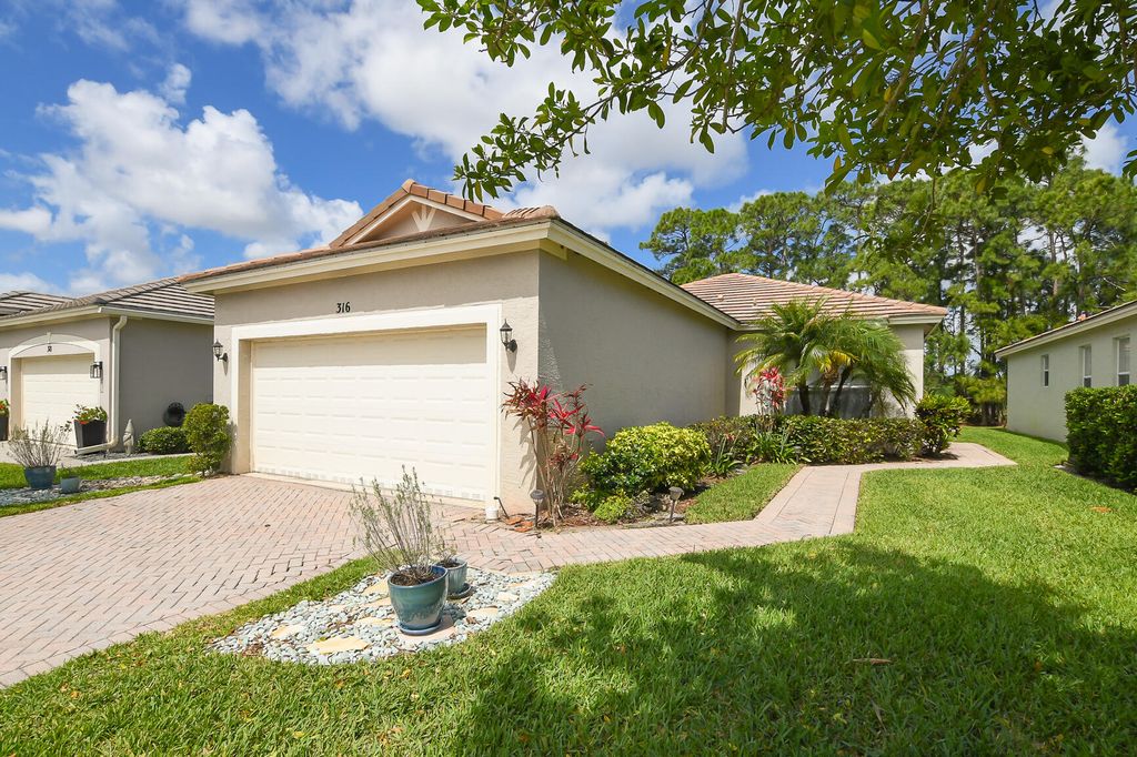 Photo of 316 SW Maclay Way, Port Saint Lucie, FL 34986 (MLS # B26016984)