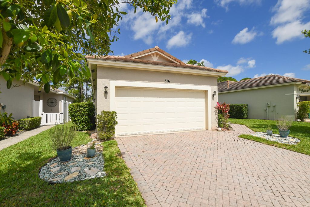 Photo of 316 SW Maclay Way, Port Saint Lucie, FL 34986 (MLS # B26016984)