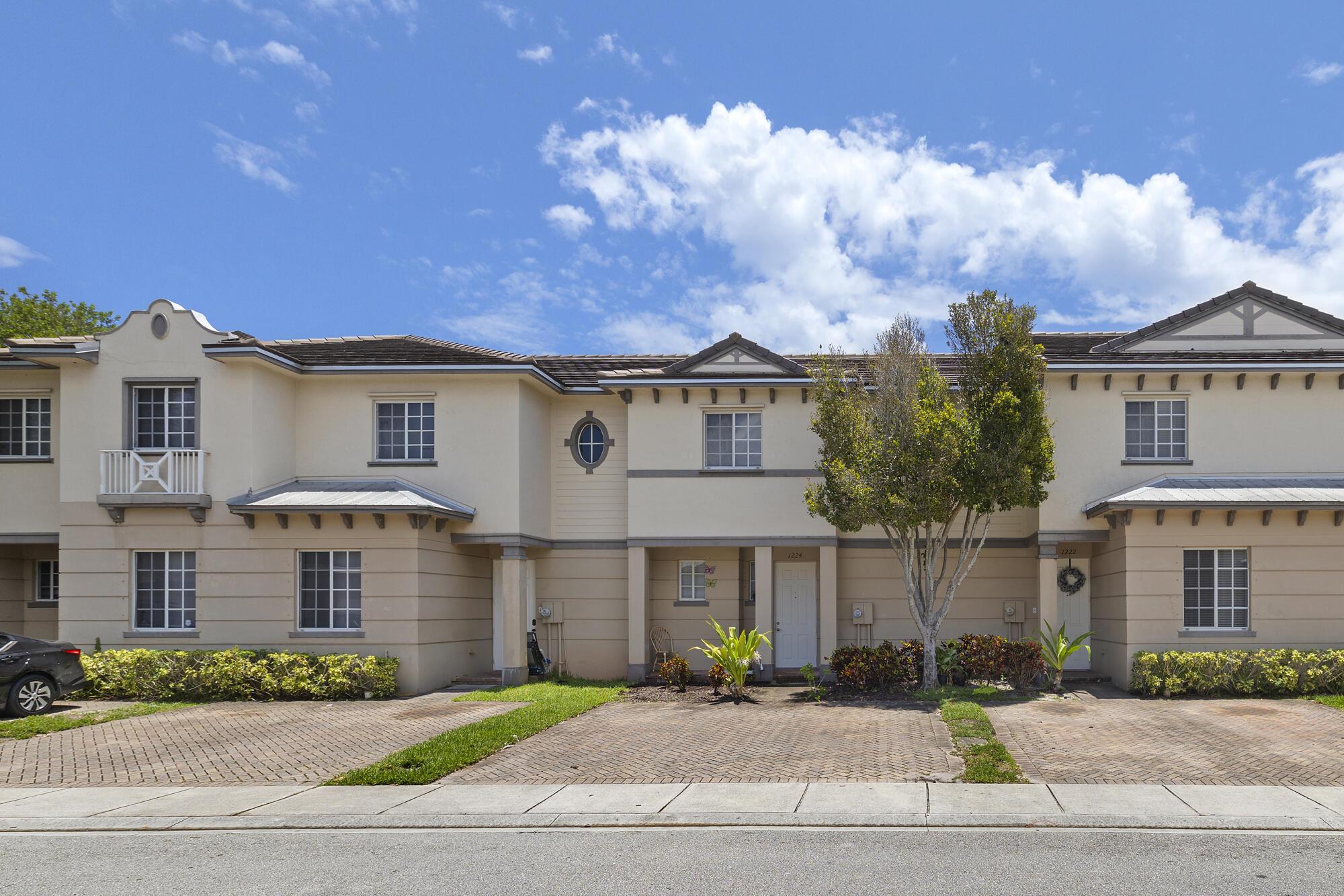 Fully renovated beautiful townhome with newer stainless steel appliances, luxury vinyl flooring, brand new carpet upstairs, brand new bathroom vanities, light fixtures, faucets, and showerheads. Newer front load washer and dryer. Located in gated community with manned guard gate with lake view behind the townhome. Low-cost monthly HOA. Has great amenities such as swimming pool, gym, kids playground, tennis courts, and Club House. Located within a 10 minute drive to the beach!! Turnkey property that is Move in READY!! Professional photos to post on July 10, 2025