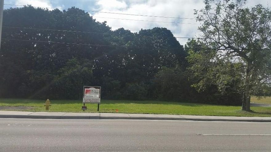 Survey on request*REDUCE!!!!!! 1.01 ACRES* REQUIRES ZONING.CORNER LOT ON BUSY STIRLING ling ROAD ACROSS FROM HIGH SCHOOL AND NEW SHOPPING CENTER/OFFICE COMPLEX. BLOCKS AWAY FROM BRAND NEW RESIDENTIAL HOME SITE UNDER CONSTRUCTION DIR: STIRLING ROAD WEST OF  PINE ISLAND ON SOUTH SIDE CORNER OF STIRLING RD