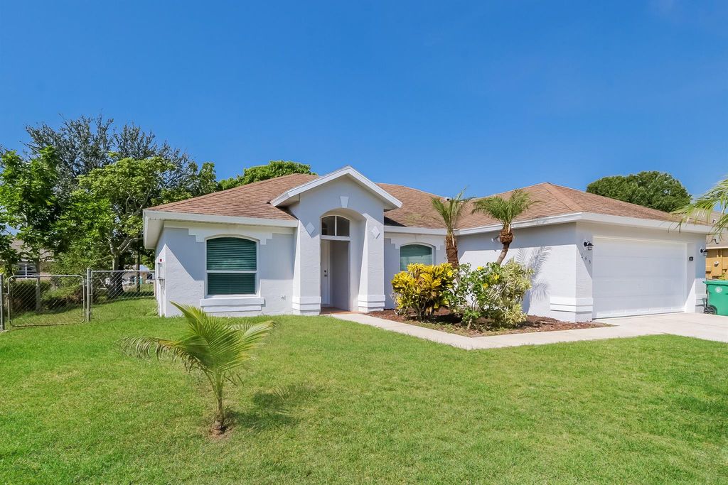 Photo of 1045 SW Adventure Lane, Port Saint Lucie, FL 34953 (MLS # R11043564)