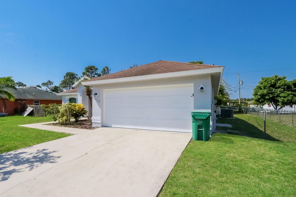 Photo of 1045 SW Adventure Lane, Port Saint Lucie, FL 34953 (MLS # R11043564)