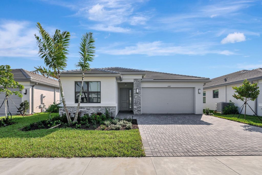 Photo of 12489 SW Emerald Estuary Ter, Port Saint Lucie, FL 34987 (MLS # R11134171)
