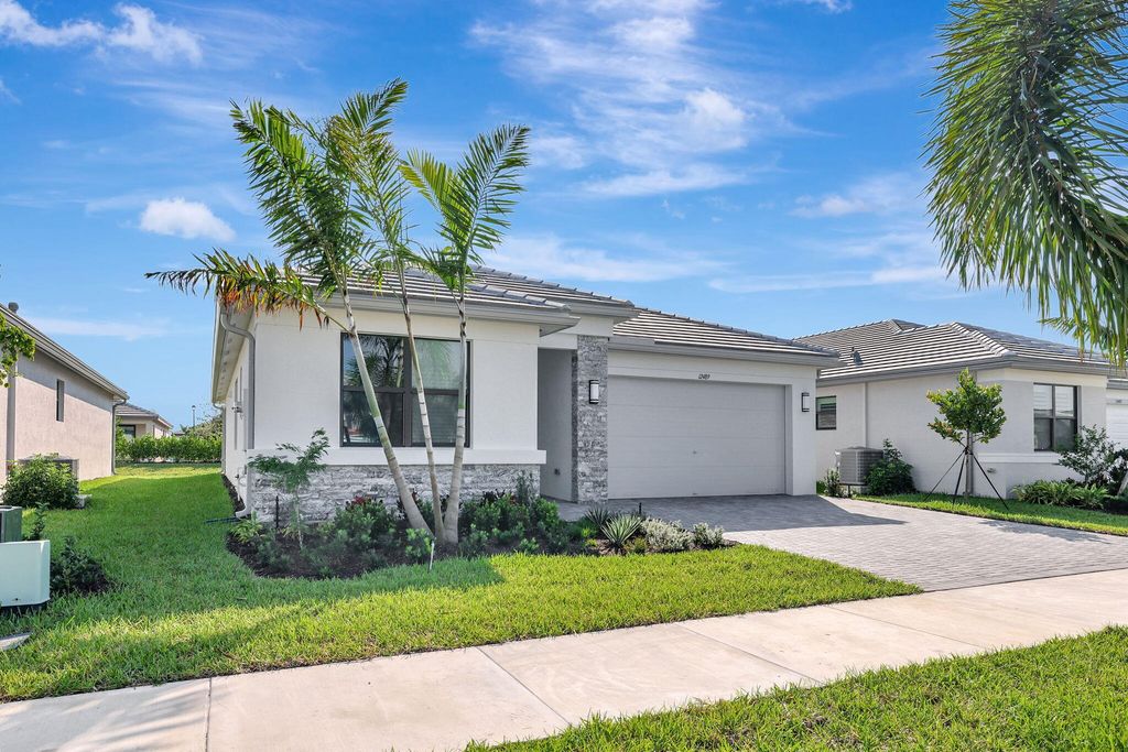 Photo of 12489 SW Emerald Estuary Ter, Port Saint Lucie, FL 34987 (MLS # R11134171)