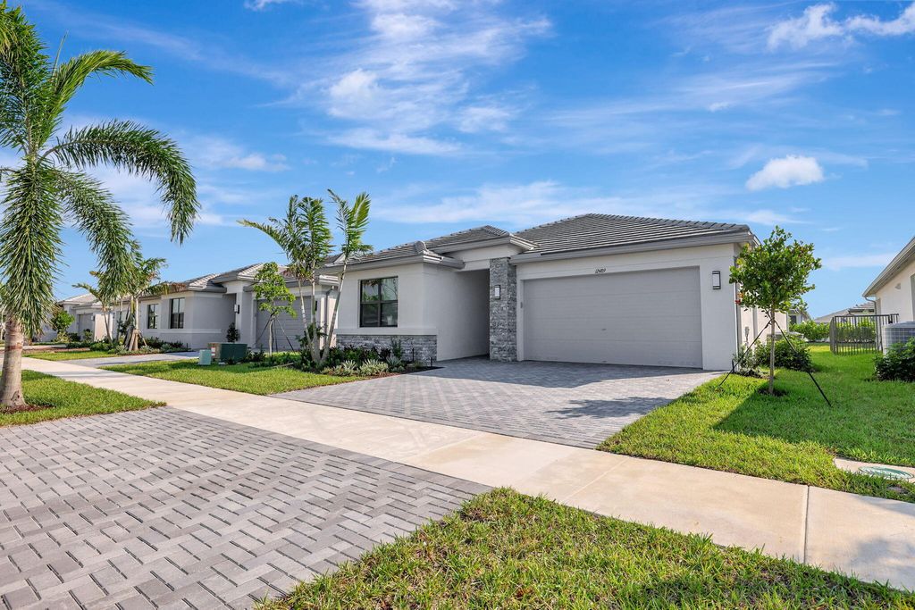 Photo of 12489 SW Emerald Estuary Ter, Port Saint Lucie, FL 34987 (MLS # R11134171)