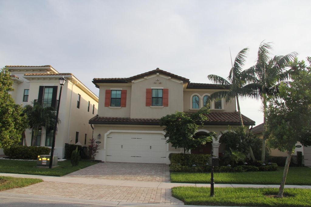Photo of 8627 Grand Prix Lane, Boynton Beach, FL 33472 (MLS # R11031974)