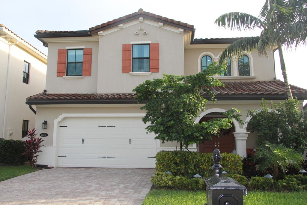 Photo of 8627 Grand Prix Lane, Boynton Beach, FL 33472 (MLS # R11031974)