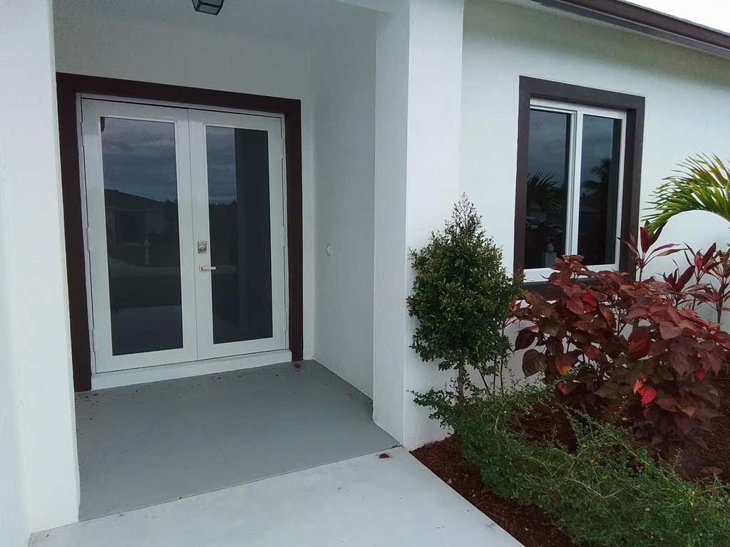 Photo of 1258 SW Santiago Avenue, Port Saint Lucie, FL 34953 (MLS # B26047361)