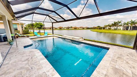 Photo of 10250 SW Coral Tree Circle, Port Saint Lucie, FL 34987 (MLS # R11129108)