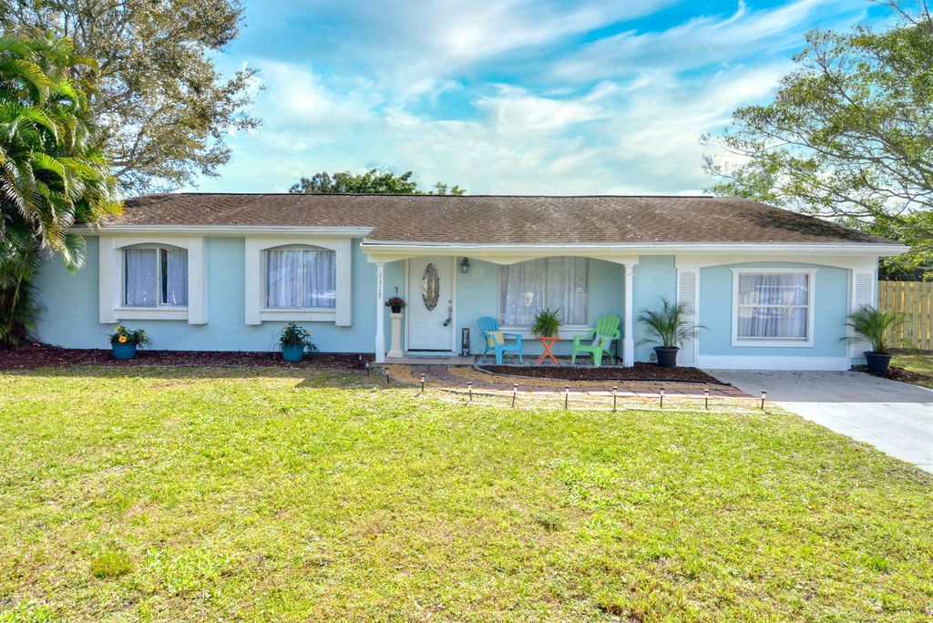 Photo of 1317 SE Larose Court, Port Saint Lucie, FL 34952 (MLS # R10960758)