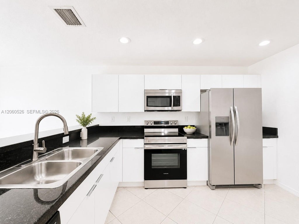 Photo of 324 NE 3rd Street #D, Hallandale Beach, FL 33009 (MLS # A12060526)