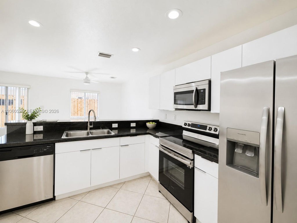Photo of 324 NE 3rd Street #D, Hallandale Beach, FL 33009 (MLS # A12060526)