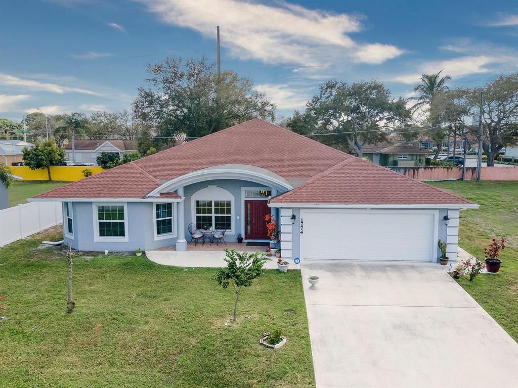 Photo of 1774 SE Minorca Avenue Ave, Port St Lucie, FL 34952 (MLS # R10780646)