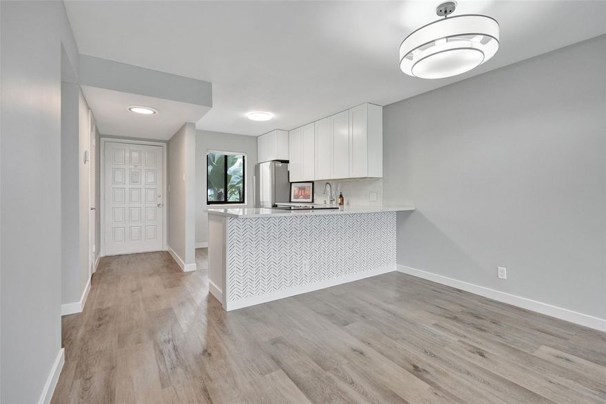 All ages community, this spacious 2-bedroom, 2-bath corner unit is located on the second floor and filled with natural light throughout. Enjoy beautiful golf course and lake views from your private screened balcony. The open floor plan features a bright kitchen, generous living area, and split bedrooms for privacy. The community offers beautifully maintained grounds, pools, walking paths, and 24-hour security. Conveniently located near shopping, dining, major highways, and just a short drive to the beach.