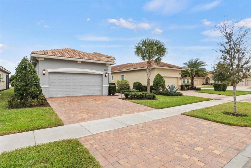 Photo of 20017 SW Caserta Way, Port Saint Lucie, FL 34986 (MLS # R10943602)