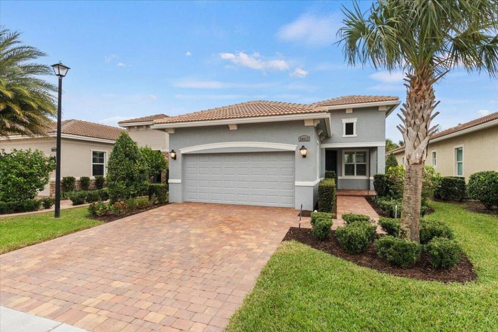 Photo of 20017 SW Caserta Way, Port Saint Lucie, FL 34986 (MLS # R10943602)