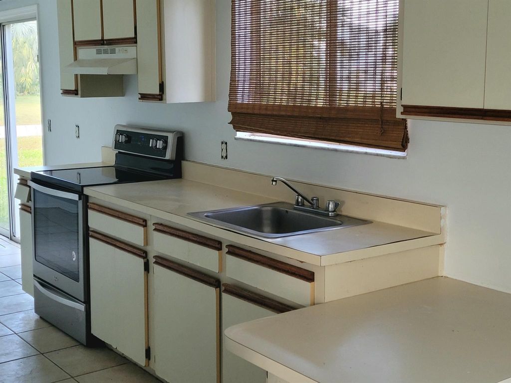 Photo of 2201 SE Baron Street, Port Saint Lucie, FL 34952 (MLS # R11052656)