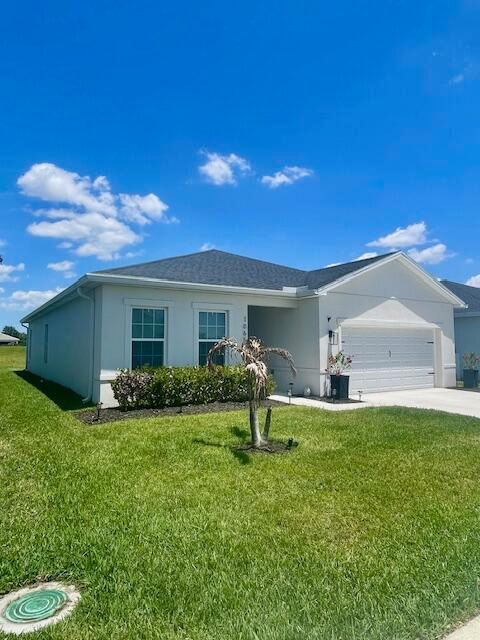 Photo of 10657 SW Vasari Way, Port Saint Lucie, FL 34987 (MLS # B26023116)