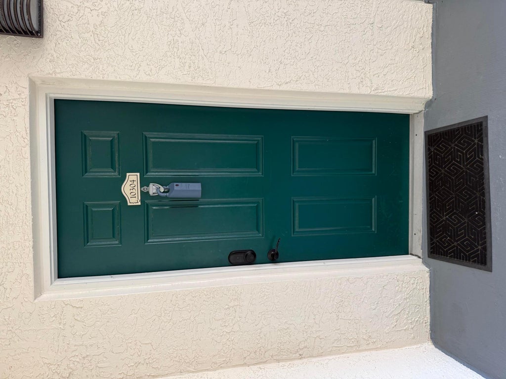 Photo of 10304 Myrtlewood Circle W #10304, Palm Beach Gardens, FL 33418 (MLS # B26074859)