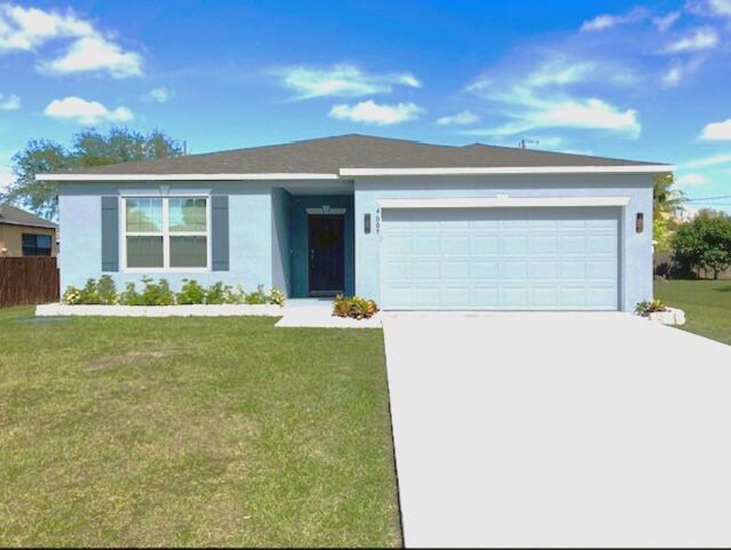Photo of 4009 SW Canrady Street, Port St Lucie, FL 34953 (MLS # R10870205)