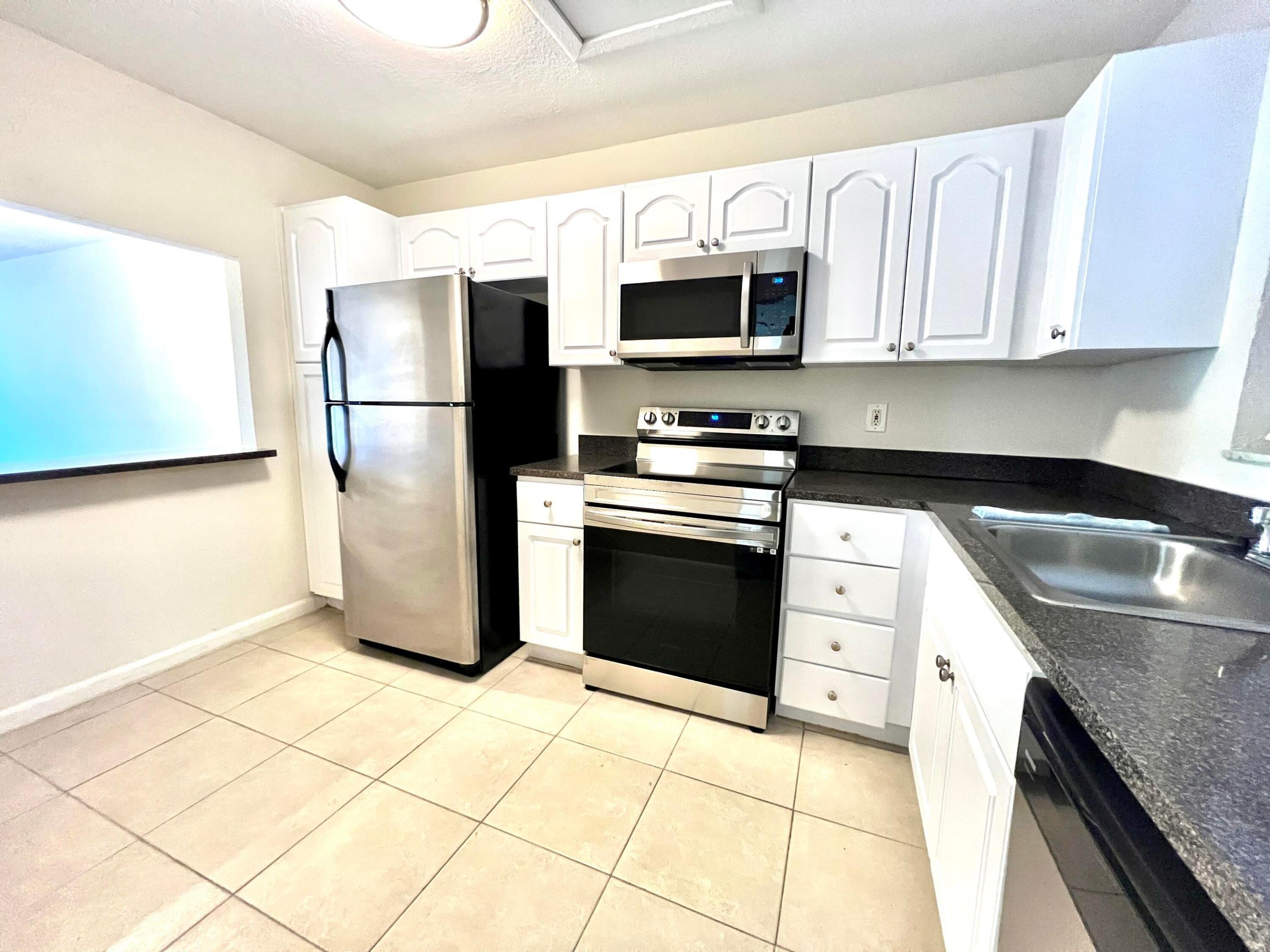 120 Sparrow Drive Apt 302, Royal Palm Beach FL 33411