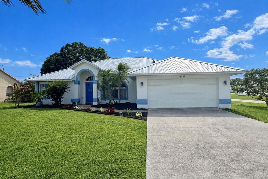 Step into a coastal-inspired retreat in Port St. Lucie! This 3-bedroom, 2-bath home offers over 1,800 sq ft with a bright, open feel from the moment you walk in.  Natural light fills the space, creating an airy and inviting atmosphere, complemented by beautifully updated bathrooms.  Situated on a spacious corner lot, the backyard is designed for both relaxation and entertaining.  Featuring a heated saltwater pool and spa that has been recently resurfaced and newly rescreened. With a brand new roof (Dec 2025), included home warranty, and a convenient location near I-95 and the Florida Turnpike, you'll enjoy easy access to shopping, dining, and everyday essentials. Roof replaced December 2025. Heated saltwater pool and spa recently resurfaced, with new pool pump installed in 2026 and full enclosure newly rescreened in 2026. AC venting updated in 2021 with UV system. Impact front windows and Miami-Dade grade hurricane shutters. Beautifully updated bathrooms. Situated on a corner lot with mature fruit trees including pineapple, mango, and avocado. Assurant home warranty included. Conveniently located near I-95, Florida Turnpike, shopping, dining, and Tradition.