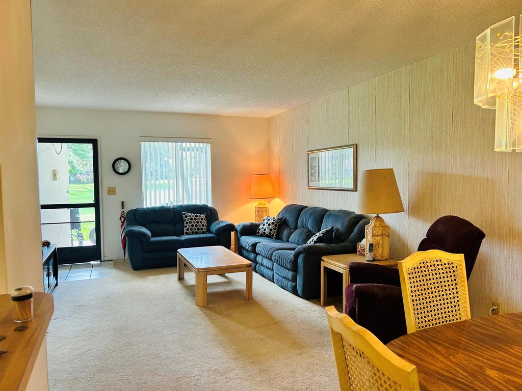 Photo of 6489 Chasewood Drive #D, Jupiter, FL 33458 (MLS # R11124257)