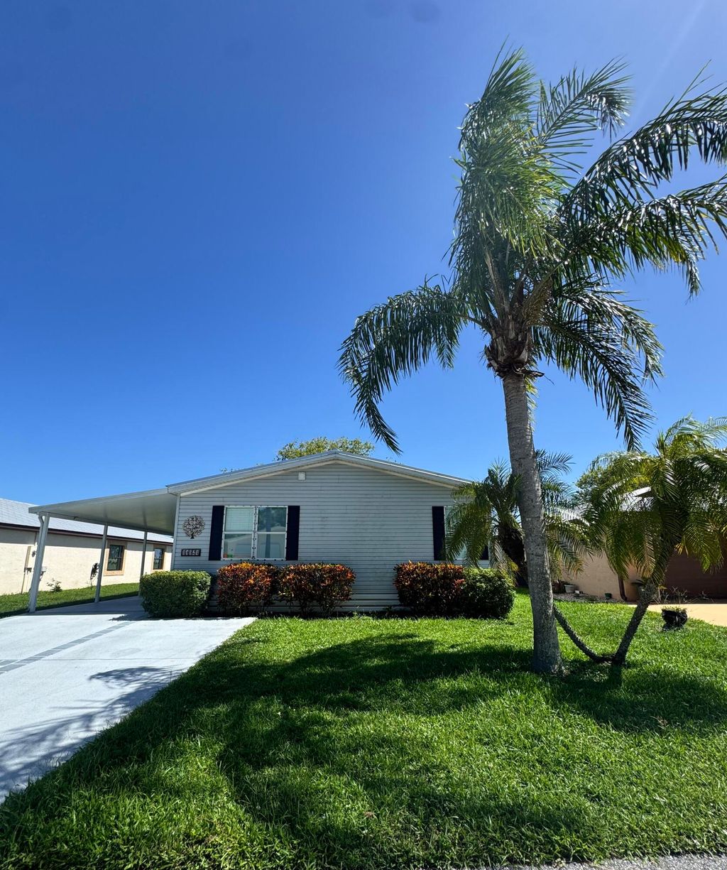 Photo of 14827 Aguila Avenue, Fort Pierce, FL 34951 (MLS # R11111714)