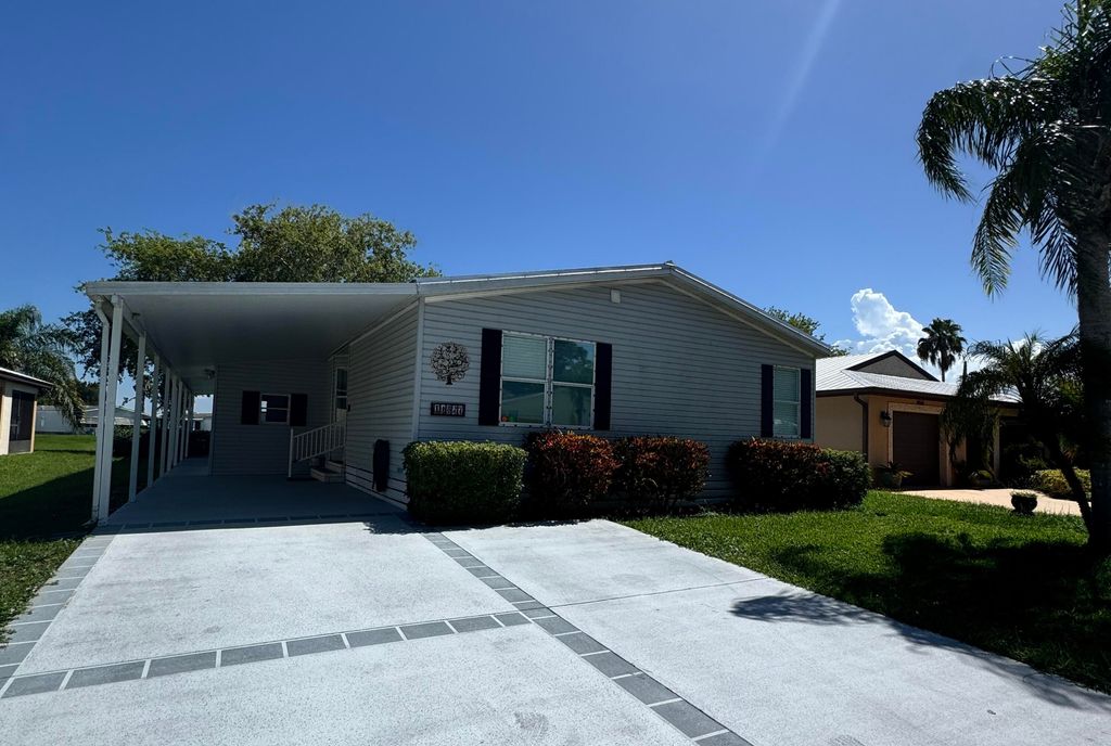 Photo of 14827 Aguila Avenue, Fort Pierce, FL 34951 (MLS # R11111714)