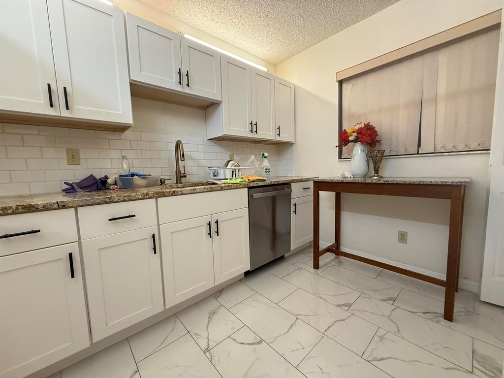 Photo of 1200 SE Parkview Place #F1, Stuart, FL 34994 (MLS # R11117098)