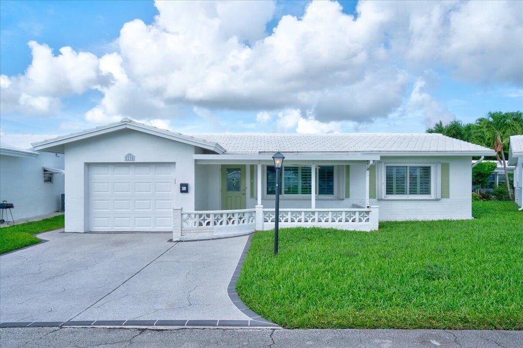 Photo of 2198 SW 12th Avenue, Boynton Beach, FL 33426 (MLS # B26076762)