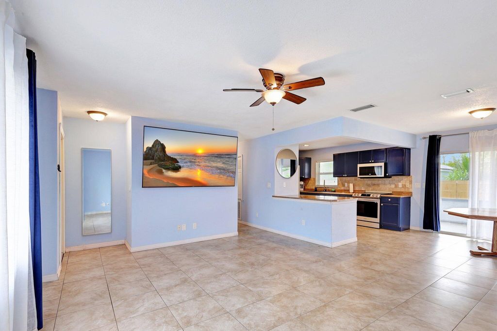Photo of 424 SE Fallon Drive, Port Saint Lucie, FL 34983 (MLS # R11009271)