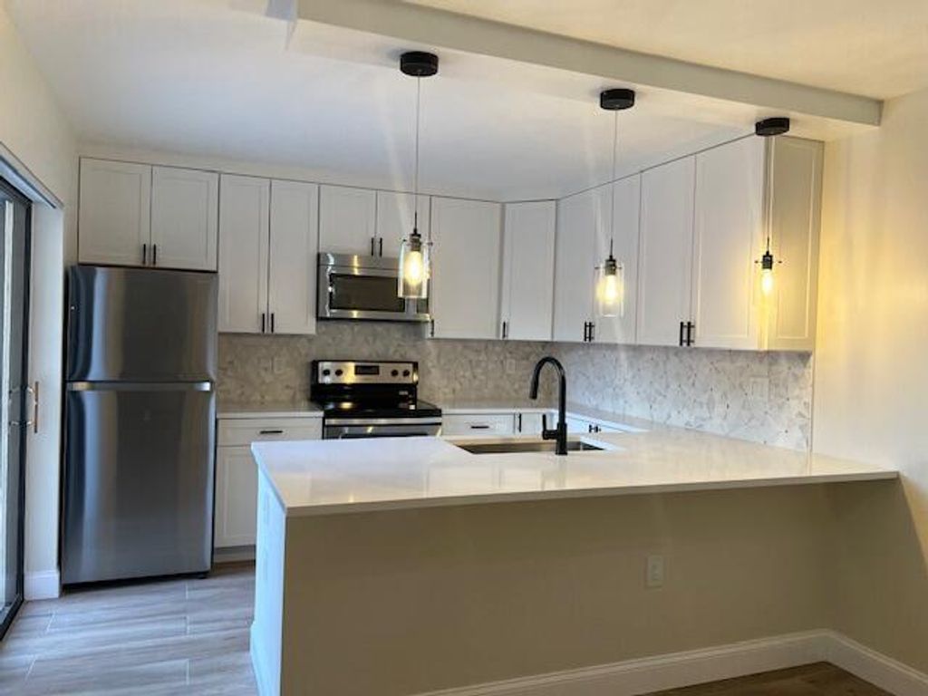 Photo of 3245 32nd Court, Jupiter, FL 33477 (MLS # R11114264)