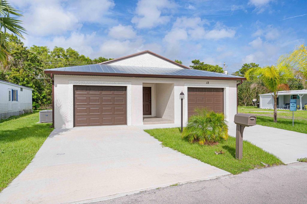 Photo of 12 Mediterranean Boulevard N, Port Saint Lucie, FL 34952 (MLS # R11035939)