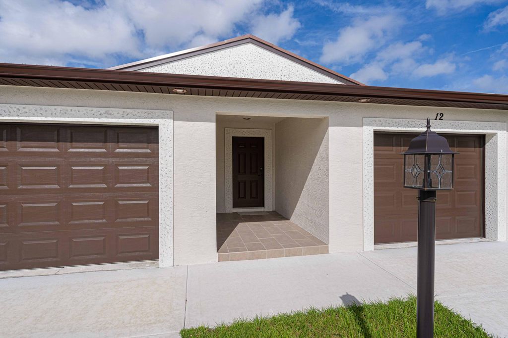 Photo of 12 Mediterranean Boulevard N, Port Saint Lucie, FL 34952 (MLS # R11035939)