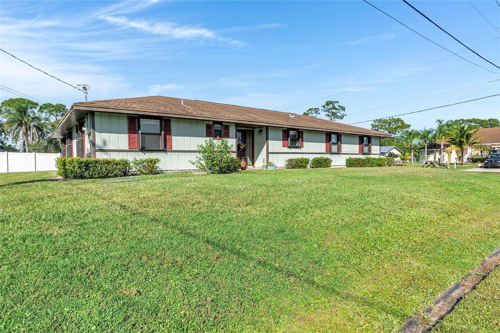 Photo of 1274 SW Fountain Avenue, Port Saint Lucie, FL 34953 (MLS # F10536390)