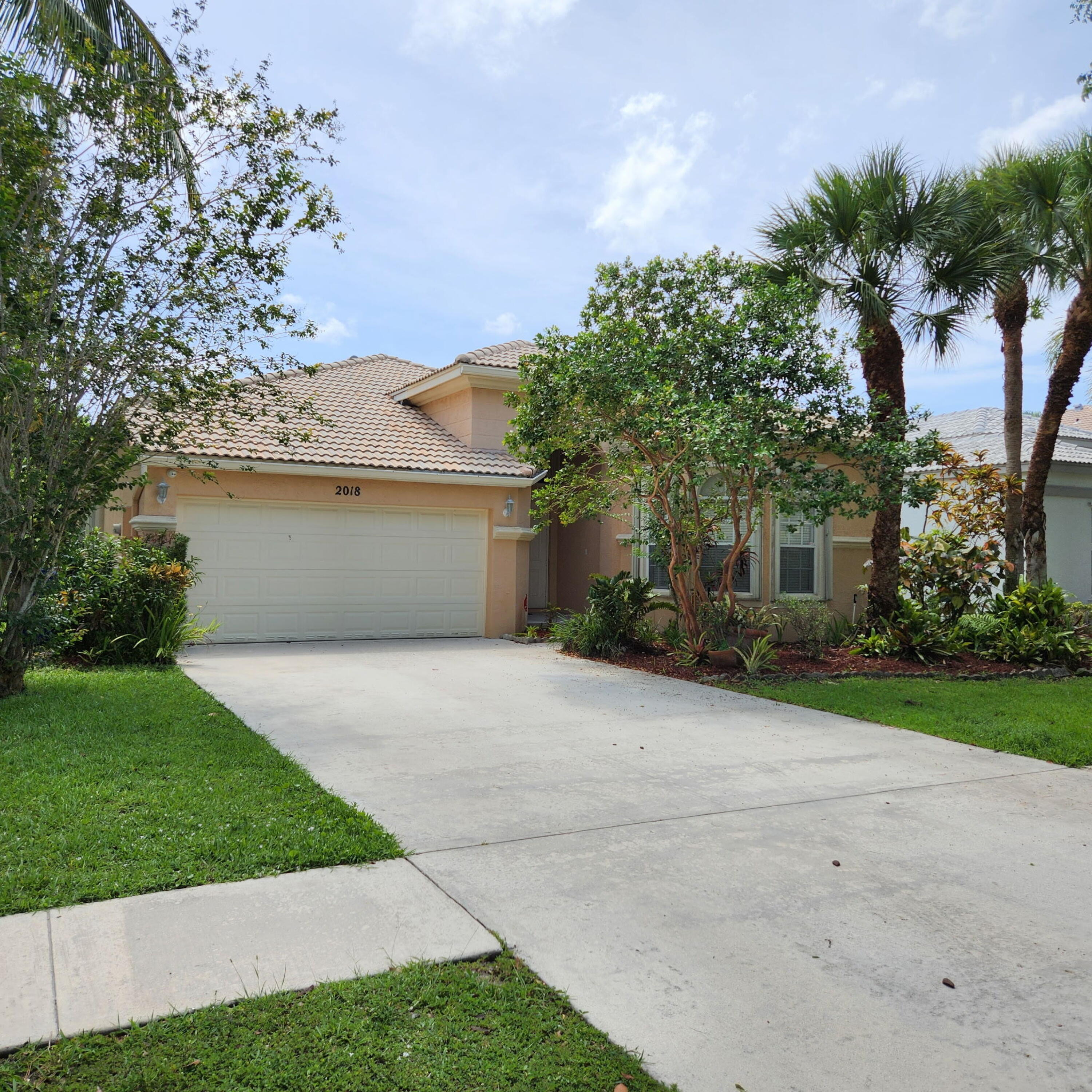 Discover your dream home in the highly sought-after golf course community of Madison Green in Wellington, FL! This gated community features a stunning 3-bedroom, 2-bath single-family home features with a large master suite and spacious 2-car garage, tile and vinyl flooring, and a screened patio leading to a private, fenced backyard--perfect for relaxation or entertaining. Enjoy resort-style amenities, including a sparkling pool, renovated clubhouse, fitness center, playground, hot tub, tennis courts, basketball, and more. Cable, internet and lawn service included. Madison Green offers luxury living with convenience and style. Don't miss this incredible opportunity!
