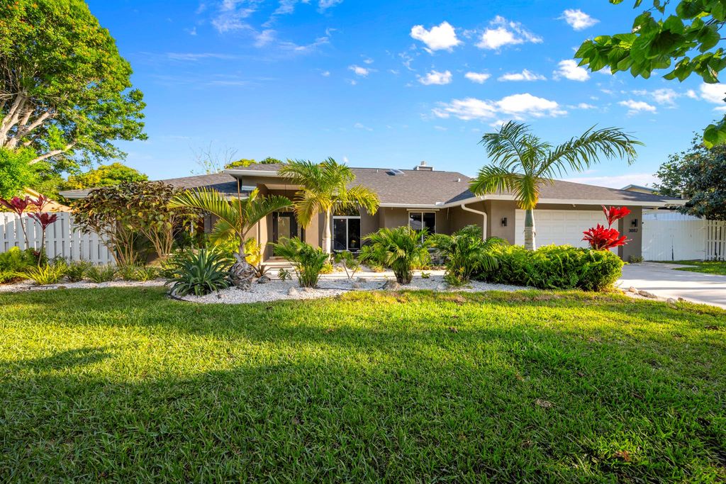 Photo of 3082 NE Ivy Lane, Jensen Beach, FL 34957 (MLS # R10992676)