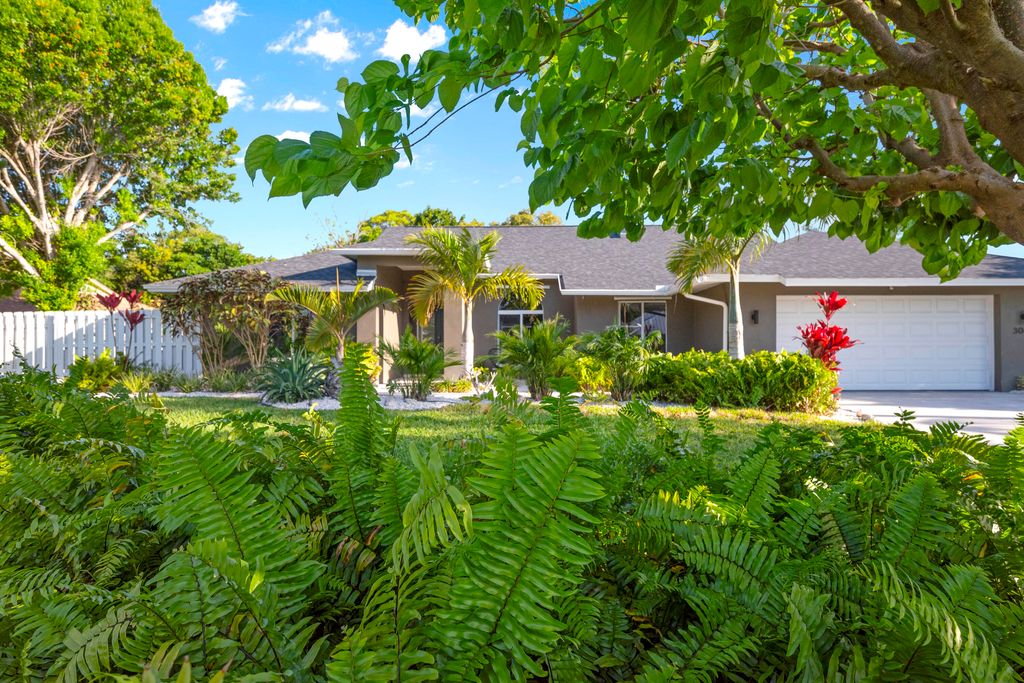 Photo of 3082 NE Ivy Lane, Jensen Beach, FL 34957 (MLS # R10992676)