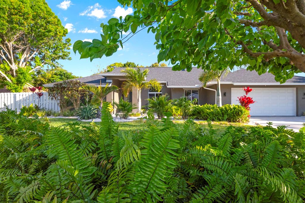 Photo of 3082 NE Ivy Lane, Jensen Beach, FL 34957 (MLS # R10992676)