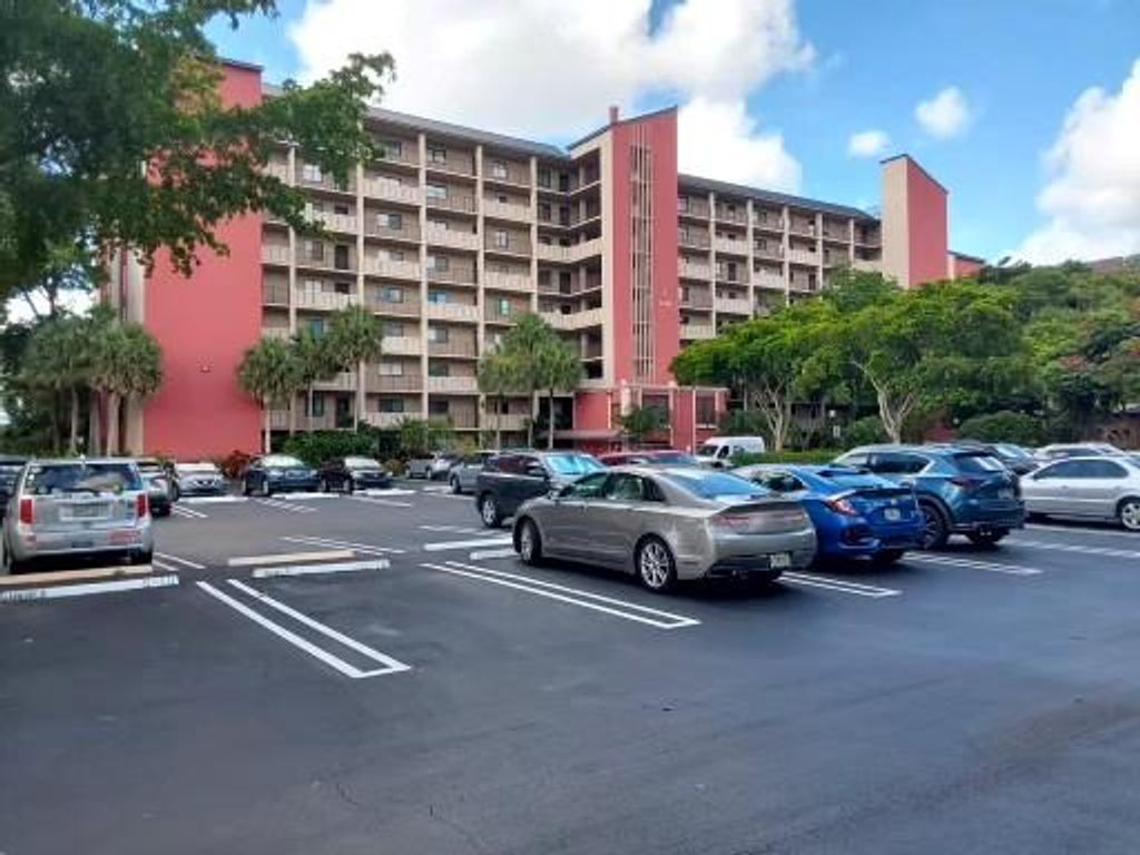 Photo of 2202 S Cypress Bend Drive #201, Pompano Beach, FL 33069 (MLS # F10419643)