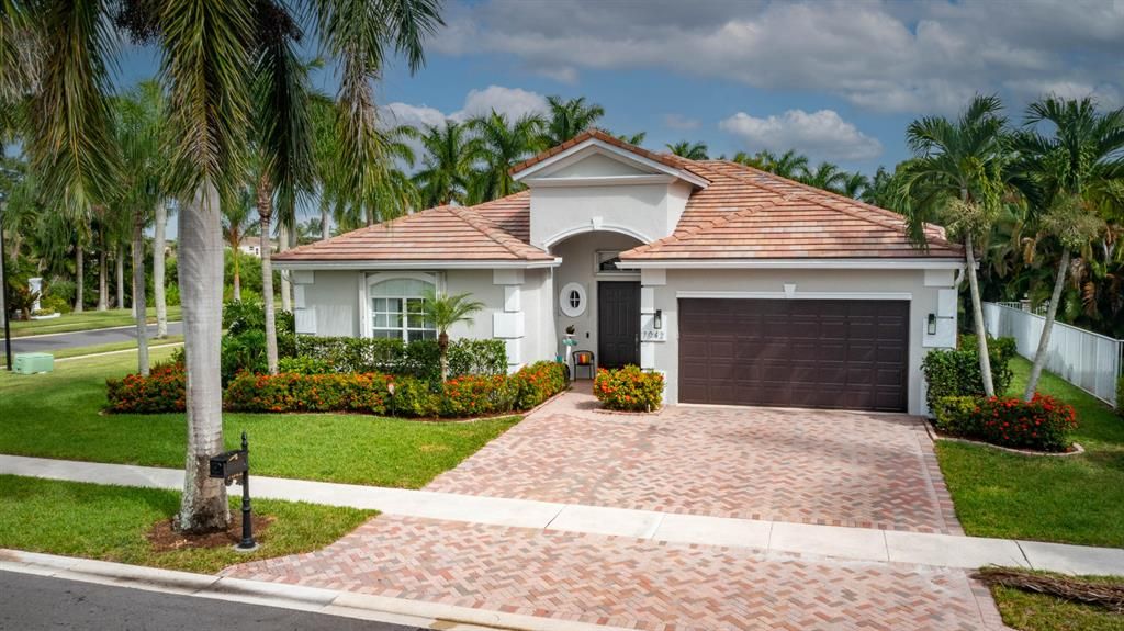 Photo of 7042 Houlton Circle Cir, Lake Worth Beach, FL 33467 (MLS # R10823695)