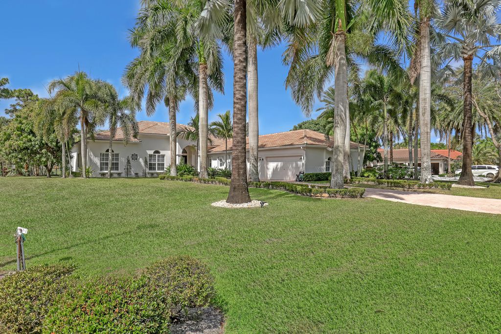 Photo of 7807 Ironhorse Boulevard, West Palm Beach, FL 33412 (MLS # R11169311)