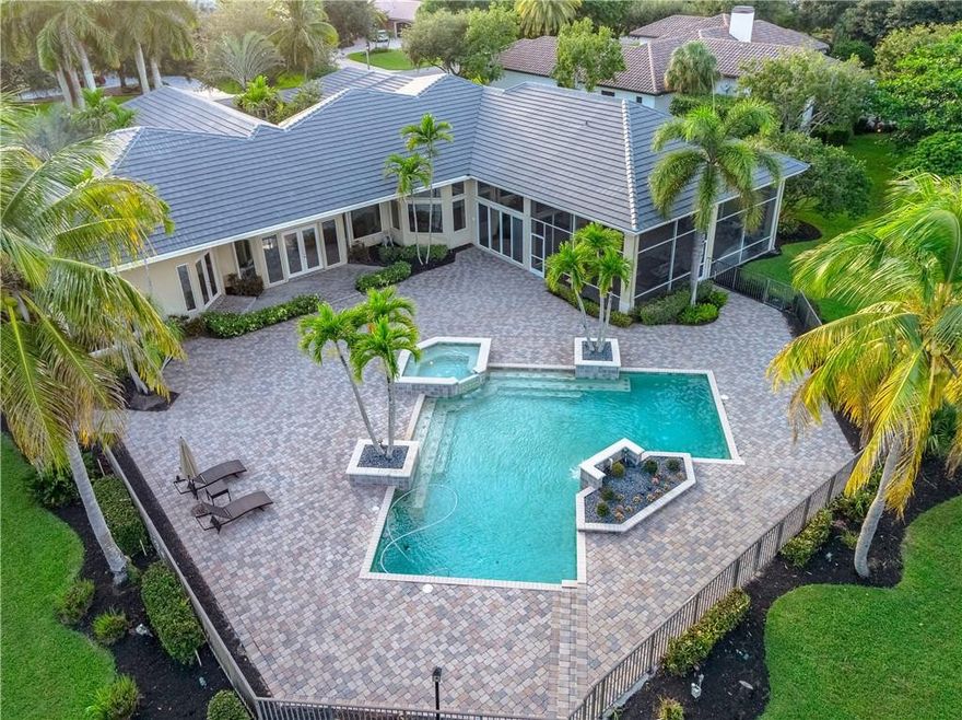 You will want to come see this custom 1 story estate on a huge 42,000 sq ft lot with over 5,000 sq ft in the prestigious gated community of Cypress Head. This home features 5bed/5.5bath + den and playroom, over-size family room, open floor plan with high ceilings, & gorgeous marble floors. New 2020 roof, all newer A/C's, amazing kitchen setup with gas/electric cooktop, & large master suite with personal sauna. Step out back to the beautiful wooded foliage view on a private canal, stunning large pool with waterfall and spa & plenty of yard space, great for entertaining! Community has tennis center, walking trails, and gorgeous new community pool with splash pad! You will want to come see this custom 1 story estate on a huge 42,000 sq ft lot with over 5,000 sq ft in the prestigious gated community of Cypress Head. This home features 5bed/5.5bath + den and playroom, over-size family room, open floor plan with high ceilings, & gorgeous marble floors. New 2020 roof, all newer A/C's, amazing kitchen setup with gas/electric cooktop, & large master suite with personal sauna. Step out back to the beautiful wooded foliage view on a private canal, stunning large pool with waterfall and spa & plenty of yard space, great for entertaining! Community has tennis center, walking trails, and gorgeous new community pool with splash pad!