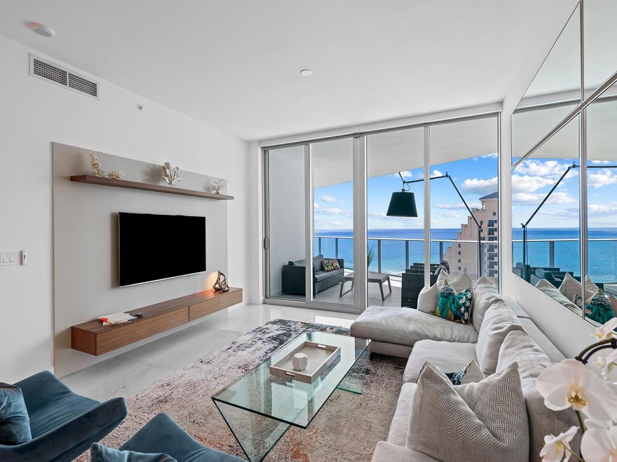 Step into your private oasis at Paramount 1003, an extraordinary 2-Bed & 2.5 Baths residence in one of the most desirable buildings in Fort Lauderdale beach. Southeast-facing unit offering breathtaking Ocean & downtown views from every room. Residents can indulge in a wealth of upscale amenities, including private elevator entry, a coffee/newspaper lounge, steam room, massage room, saunas and showers, yoga studio, guest suites, a fully equipped gym with Peloton area, barbecue area, and an oceanfront infinity Olympic-sized pool with a hot tub, as well as seven days a week beach service. Also, the building is home to Truluck's, offering world-class dining just steps from your door. AVAILABLE NOW for 6 MONTHS to 1 YEAR. No short term rental. Call for details.