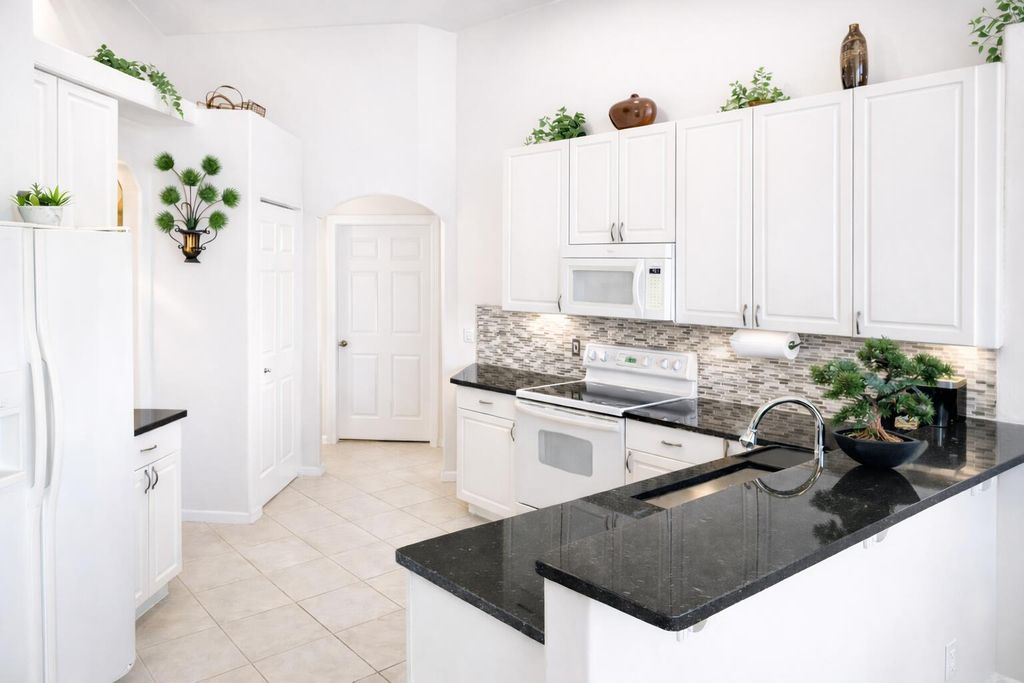 Photo of 1260 SW Maplewood Drive, Port Saint Lucie, FL 34986 (MLS # B26013631)